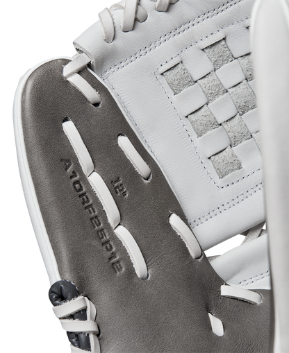 Close-up of a Wilson A1000 P12 12" Fastpitch Glove (WBW10259212) shows gray and white Full Grain leather, visible stitching, and a woven rectangular pattern with "A1000 P12 12”" embossed inside the glove.