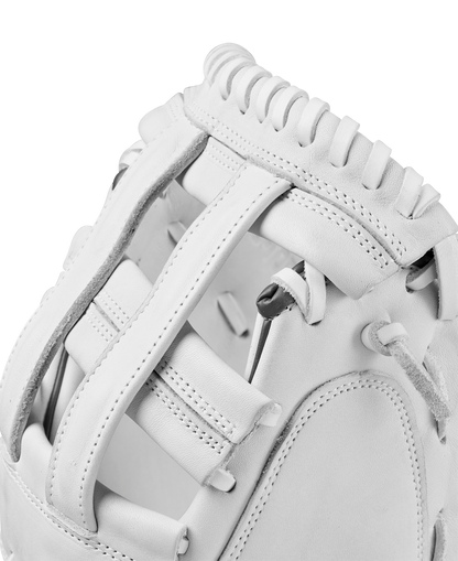 Close-up view of the Wilson A1000 CM33 33" Fastpitch Catcher's Mitt, crafted from full grain leather with detailed stitching, laces, and padding on the webbing and thumb area.