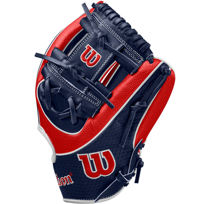 The Wilson A2K 1724SS 11.75" Baseball Glove (FALL 2024) features navy blue and red Pro Stock Select leather, navy SuperSkin webbing and stitching, white accents, and the Wilson logo on the thumb and wrist.
