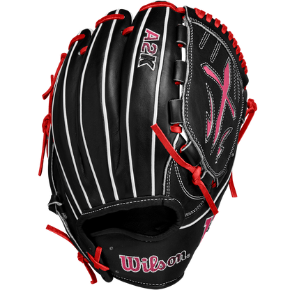 A Wilson A2K B23 12" Baseball Glove (FALL 2024, WBW10261812) in black Pro Stock leather, features red laces, white stitching, and pink embroidered accents; shown from the back on a white background.