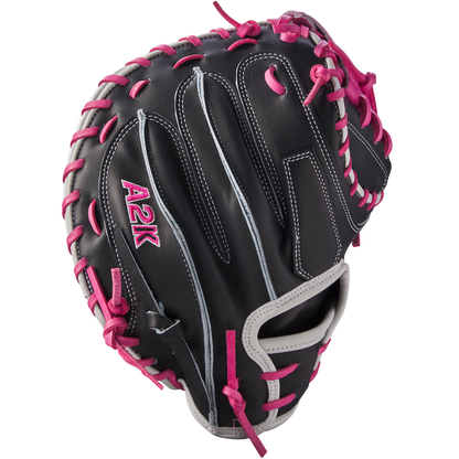 The Wilson A2K M23 33.5" Catcher's Mitt (WBW102622335) features black and pink Pro Stock Select leather.