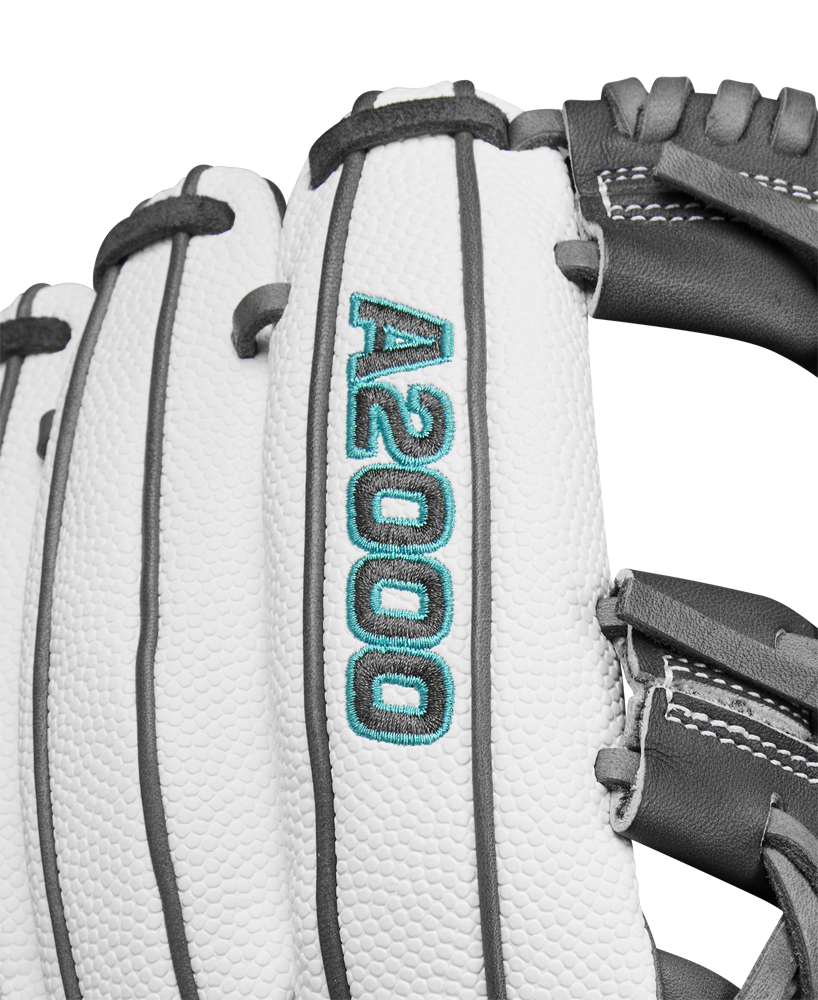 Close-up of the Wilson A2000 H75SS 11.75" Fastpitch Glove (WBW1026231175) in white with black and gray lacing, featuring SuperSkin material and blue-green A2000 embroidery on the finger.