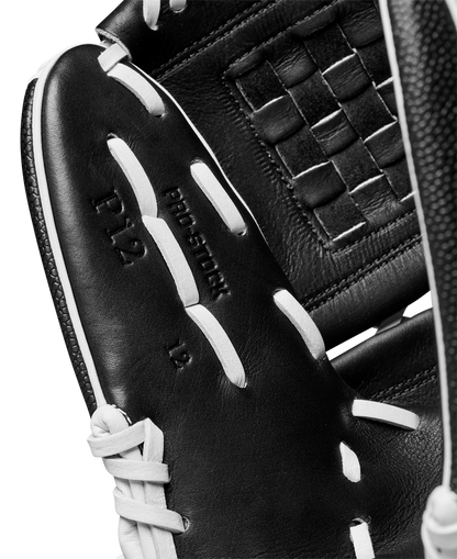 A close-up of the Wilson A2000 P12 12" Fastpitch Glove (WBW10267512) highlights its intricate lacing and detailed design.