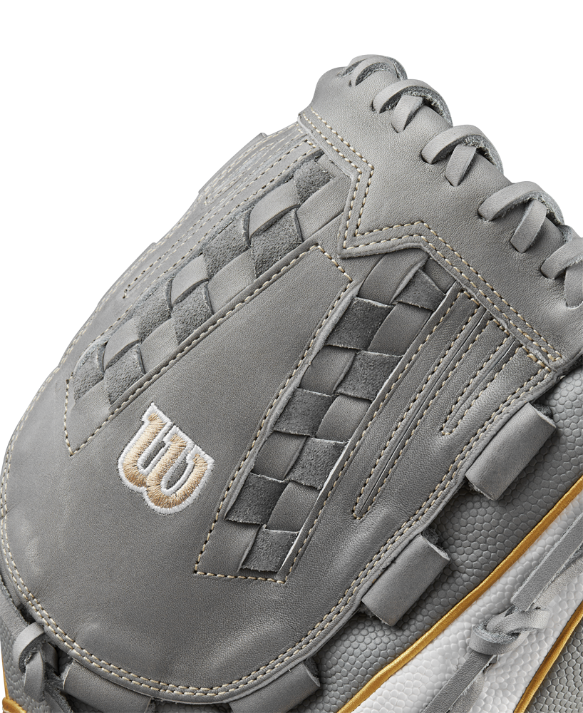 Close-up of a Wilson A2000 V125SS 12.5" Fastpitch Glove (WBW102677125) in gray, showing intricate stitching, woven detailing, a white W logo, varied textures, and brown edge trim.