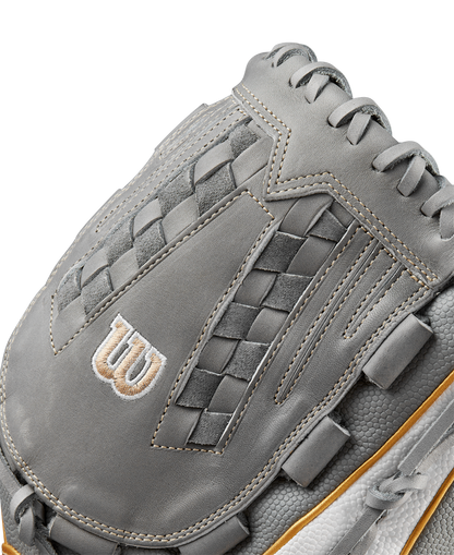 Close-up of a Wilson A2000 V125SS 12.5" Fastpitch Glove (WBW102677125) in gray, showing intricate stitching, woven detailing, a white W logo, varied textures, and brown edge trim.