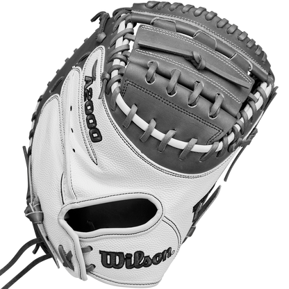 A close-up of the Wilson A2000 FPCM23 34" Fastpitch Catcher's Mitt (WBW10268134) in white and gray Pro Stock Leather, showing detailed stitching, lacing on the pocket and webbing, with the Wilson brand name clearly visible.
