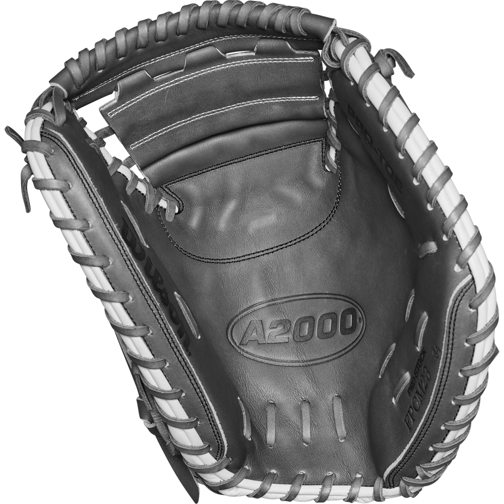 A close-up of the Wilson A2000 FPCM23 34" Fastpitch Catcher's Mitt (WBW10268134) in black and white Pro Stock Leather, featuring detailed stitching, lacing, and embossed branding.