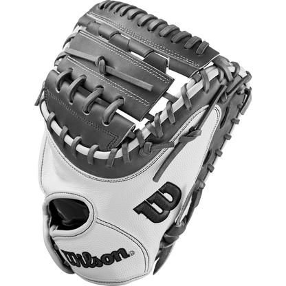 The Wilson A2000 FPCM23 34" Fastpitch Catcher's Mitt (WBW10268134) features a white and gray design with black stitching, the Wilson logo on the thumb, and is crafted from durable Pro Stock Leather. Shown against a plain white background.