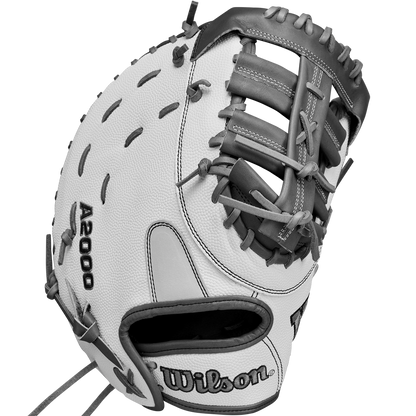The Wilson A2000 1620SS 12.5" Fastpitch First Base Mitt (WBW102682125) by Wilson features white and gray Pro Stock leather, black stitching and laces, plus logos on the thumb and wrist, shown isolated on a white background.