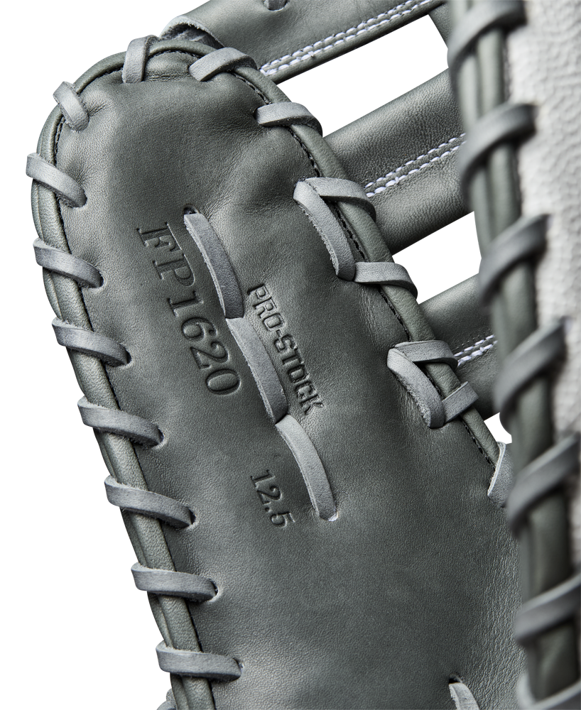 Close-up of a Wilson A2000 1620SS 12.5" Fastpitch First Base Mitt (WBW102682125) in gray, displaying embossed Pro Stock leather with visible stitching and lacing details.