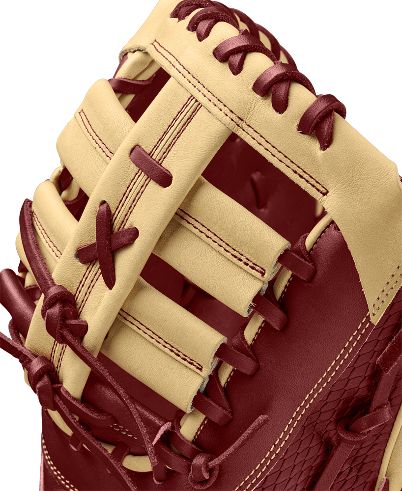 A close-up of the Wilson A2K 1679 12.5" First Base Mitt (WBW102684125), crafted with Pro Stock Select leather and featuring a Single Post Web.