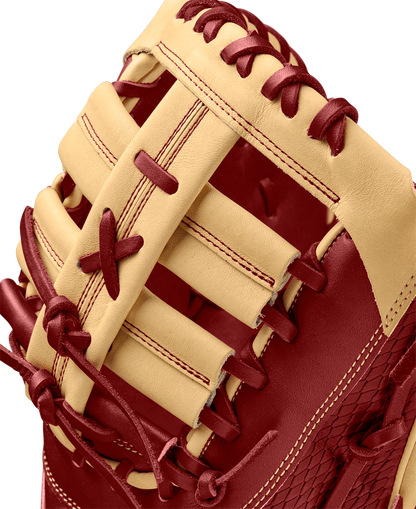 A close-up of the Wilson A2K 1679 12.5" First Base Mitt (WBW102684125), crafted with Pro Stock Select leather and featuring a Single Post Web.