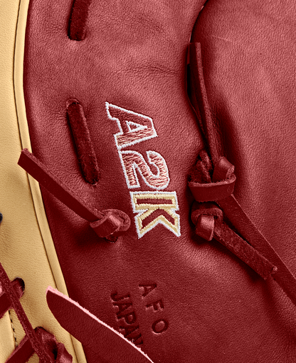 A close-up of the Wilson A2K 1679 12.5" First Base Mitt, crafted from Pro Stock Select leather with a durable Single Post Web.