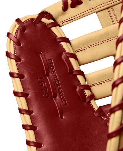 A close-up of the Wilson A2K 1679 12.5" First Base Mitt (WBW102684125), crafted from Pro Stock Select leather with a Single Post Web, from Wilson's Fall 2024 collection.