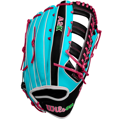 The Wilson A2K 1810SS 12.75" Baseball Glove (Winter 2024: WBW1026881275) features a turquoise and black design with pink laces, white piping, Pro Stock Select leather, and embroidered logos, shown on a white background.