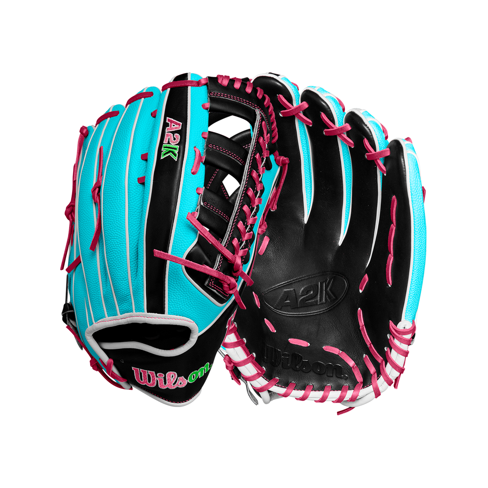 The Wilson A2K 1810SS 12.75" Baseball Glove (Winter 2024, WBW1026881275) features black, teal, and white leather with pink laces, an open web design, Pro Stock Select leather construction, and prominent Wilson branding.