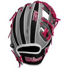 The Wilson A2K 1786SS 11.5" Baseball Glove (SPRING 2025) features a gray and black design with pink laces and stitching, Pro Stock Select leather, and the Wilson logo on the palm and thumb.