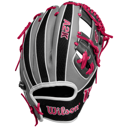 The Wilson A2K 1786SS 11.5" Baseball Glove (SPRING 2025) features a gray and black design with pink laces and stitching, Pro Stock Select leather, and the Wilson logo on the palm and thumb.
