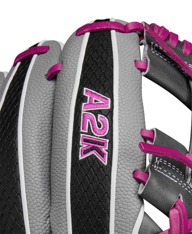 Close-up of the Wilson A2K 1786SS 11.5" Baseball Glove—SPRING 2025, featuring gray, black, and pink Pro Stock Select leather with pink laces, textured detailing, and “A2K” embroidered in pink and white on a black strip.
