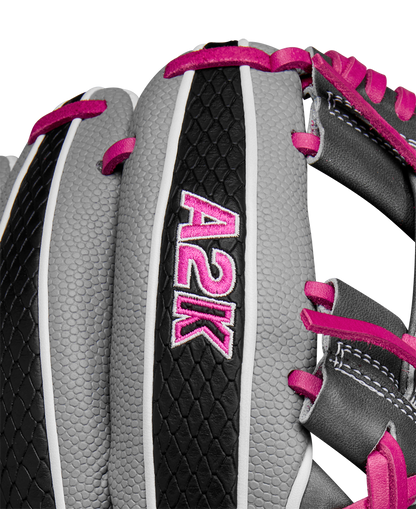 Close-up of the Wilson A2K 1786SS 11.5" Baseball Glove—SPRING 2025, featuring gray, black, and pink Pro Stock Select leather with pink laces, textured detailing, and “A2K” embroidered in pink and white on a black strip.