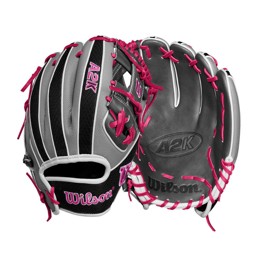 The Wilson A2K 1786SS 11.5" Baseball Glove (SPRING 2025) by Wilson is shown in black, gray, and white leather with bright pink laces and accents, displayed front and back against a plain white background.