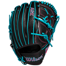 The Wilson A2K B2 12" Baseball Glove SPRING 2025 features black Pro Stock Select leather, teal blue laces and stitching, pink accents, a Closed 2-Piece Web, and textured palm patterns for premium performance.