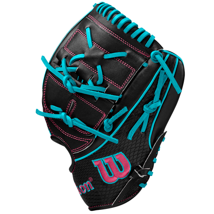 The Wilson A2K B2 12" Baseball Glove (SPRING 2025: WBW10269212) is black with Pro Stock Select leather, bright teal laces, pink stitching, a Closed 2-Piece Web, and a pink Wilson “W” logo on the wrist, shown on a white background.