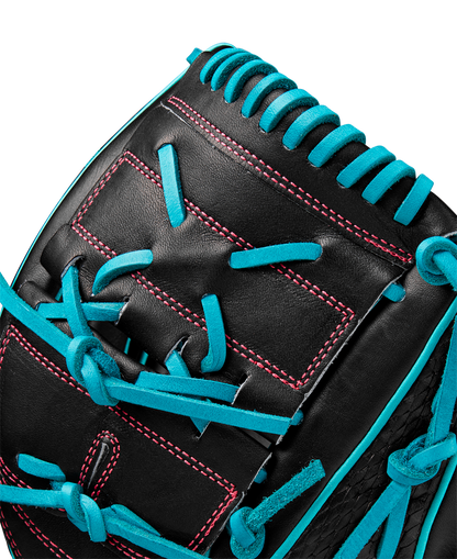 Close-up of the Wilson A2K B2 12" Baseball Glove (SPRING 2025: WBW10269212) with bright blue laces, pink stitching, and a Closed 2-Piece Web. Expert Wilson craftsmanship is highlighted against a plain white background.