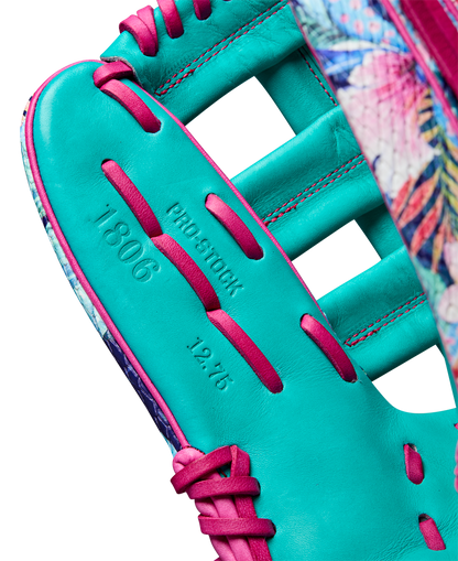 Close-up of the Wilson A2000 RA56 12.75" Randy Arozarena GM Baseball Glove, WBW1026941275, featuring turquoise and pink leather with floral accents—just like the pro's glove for Spring 2025.