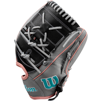 A Wilson A2000 MA14SS 12.25" Fastpitch Glove in grey with black and pink accents, teal W logo, and white stitching is crafted from Pro Stock leather and shown from the side on a white background.