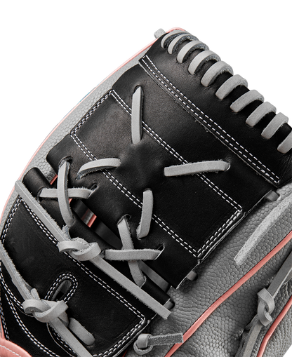 Close-up of the Wilson A2000 MA14SS 12.25" Fastpitch Glove (WBW1027221225) in black and gray leather with white stitching and pink accents, highlighting detailed lacing—perfect for fastpitch pitchers.