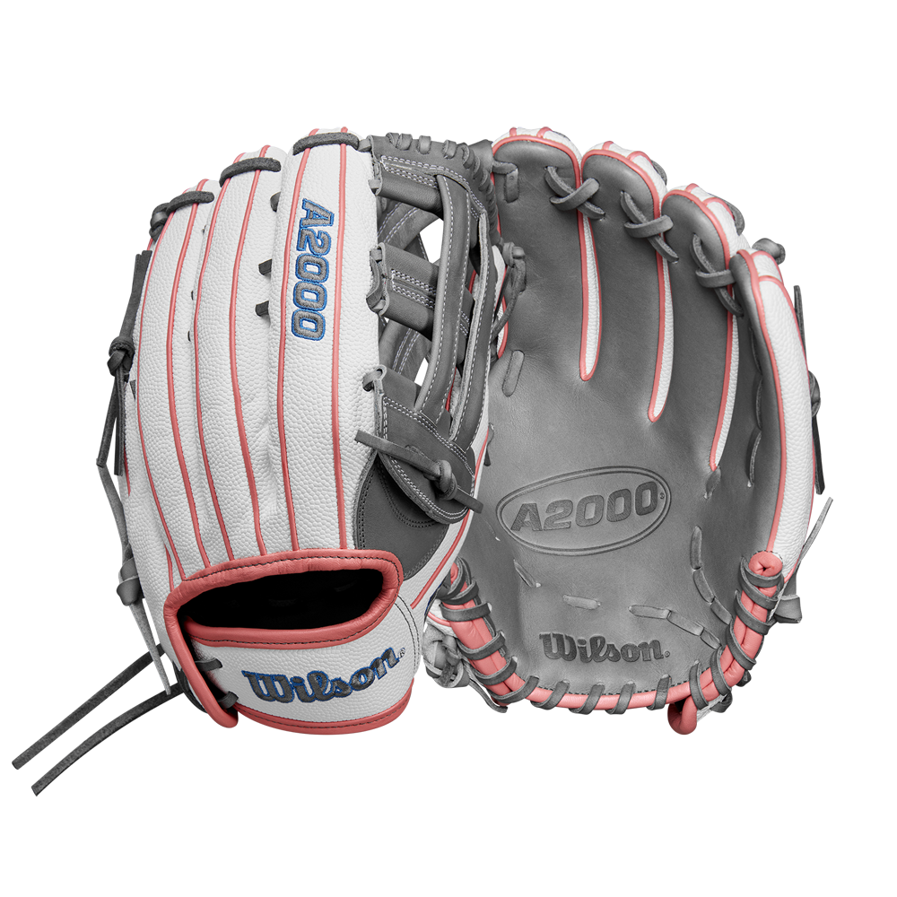 Two Wilson A2000 FP50SS 12.25" Fastpitch Gloves (FALL 2024: WBW1027371225) are shown—one displays the A2000 and Wilson logos on the outside, the other shows inside laces. Both use Pro Stock® Leather in white, grey, and pink.