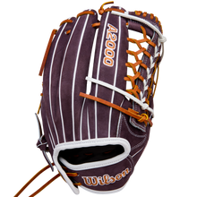 The Wilson A2000 T125 12.5" Aliyah Andrews GM Fastpitch Glove (WBW102745125) by Wilson features dark brown leather, white stripes, tan lacing, and embroidered A2000 and Wilson logos—ideal for fastpitch outfielders like Aliyah Andrews.