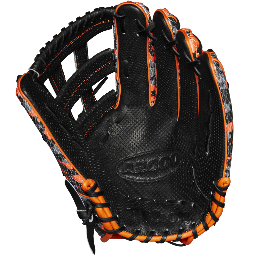 The Wilson A2000 SC1777SS 12.75" GOTM October 2024 baseball glove features a limited black design with orange accents, grey patterned details, embossed A5000 palm text, Pro Stock leather, and fine stitching. Model: WBW1027911275.