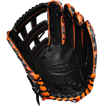 The Wilson A2000 SC1777SS 12.75" GOTM October 2024 baseball glove features a limited black design with orange accents, grey patterned details, embossed A5000 palm text, Pro Stock leather, and fine stitching. Model: WBW1027911275.