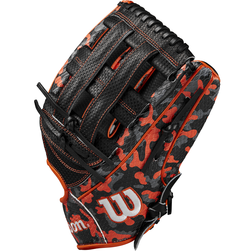 The Wilson A2000 SC1777SS 12.75" GOTM October 2024 baseball glove features a black and red camo pattern with orange accents, Pro Stock leather construction, white Wilson W logo, and detailed stitching.