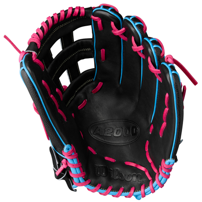 The Wilson A2000 1777SS 12.75" Baseball Glove (WBW1032221275) by Wilson features black SuperSkin, pink and blue laces, and visible stitching with branding on the palm; shown open, Summer 2025 edition.