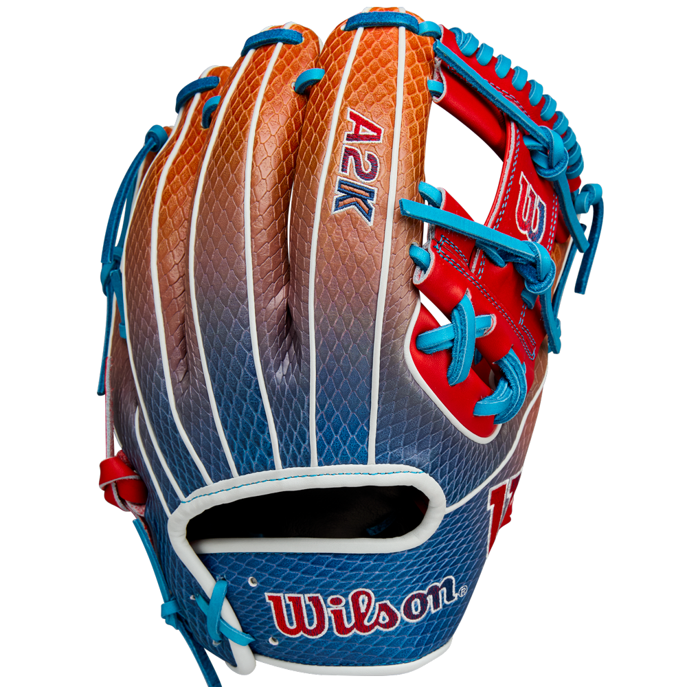 The Wilson A2K 1786SS 11.5" Baseball Glove (WBW103290115) features a gradient orange, brown, and blue design with blue laces, red accents, and durable SuperSnakeSkin construction. Summer 2025 release by Wilson.