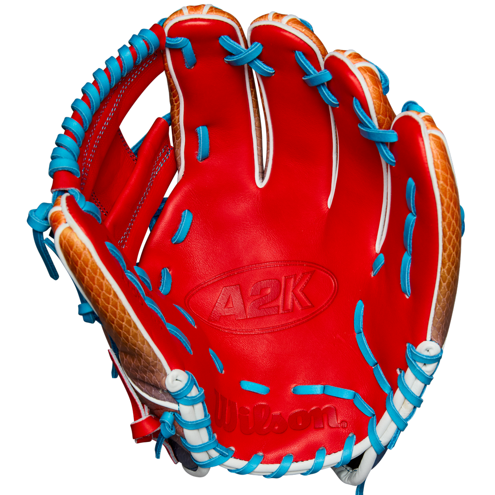 The Wilson A2K 1786SS 11.5" Baseball Glove (WBW103290115) features a red design with blue laces and SuperSnakeSkin for durability, crafted in the popular A2K 1786SS style—ideal for infielders.