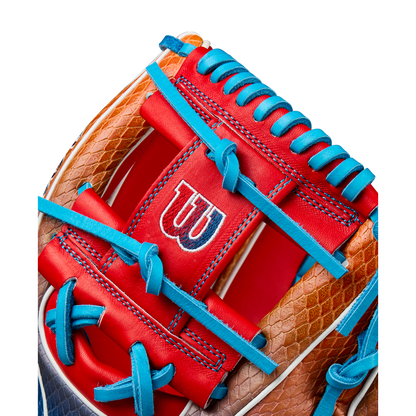 Close-up of the Wilson A2K 1786SS 11.5" Baseball Glove (WBW103290115), showcasing brown, red, and blue leather with blue laces, SuperSnakeSkin accents, and the Wilson W logo on a bold red panel.