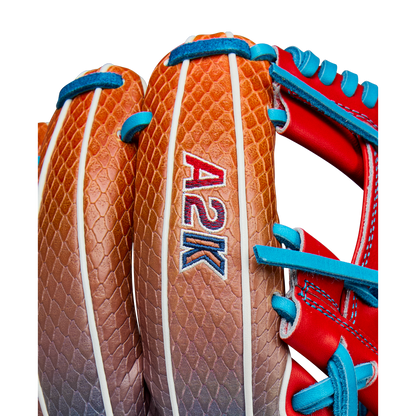 Close-up of the Wilson A2K 1786SS 11.5" Baseball Glove (WBW103290115) with a brown and tan textured design, SuperSnakeSkin accents, and blue and red laces, released for Summer 2025.