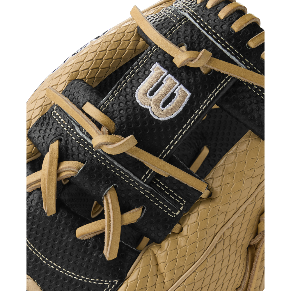 Close-up of the Wilson A2000 KBH13 11.75" Ke'Bryan Hayes GM Baseball Glove, featuring textured tan and black leather, tan laces, visible stitching, and an embroidered white W logo on a black panel. Summer 2025: WBW1032961175.