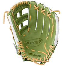 The Wilson A2000 FP50SS 12.25" Fastpitch Glove (WBW1033001225) features a green and white design with tan laces, visible Wilson branding on the palm, and is crafted from premium Pro Stock leather.