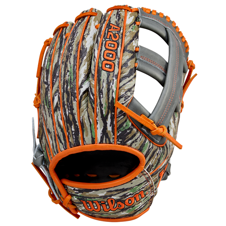 The Wilson A2000 GH2 11.75" Gunnar Henderson GM Baseball Glove (WBW1034511175) features a camouflage pattern with orange trim, gray laces, and the Wilson brand name stitched in orange on the wrist.