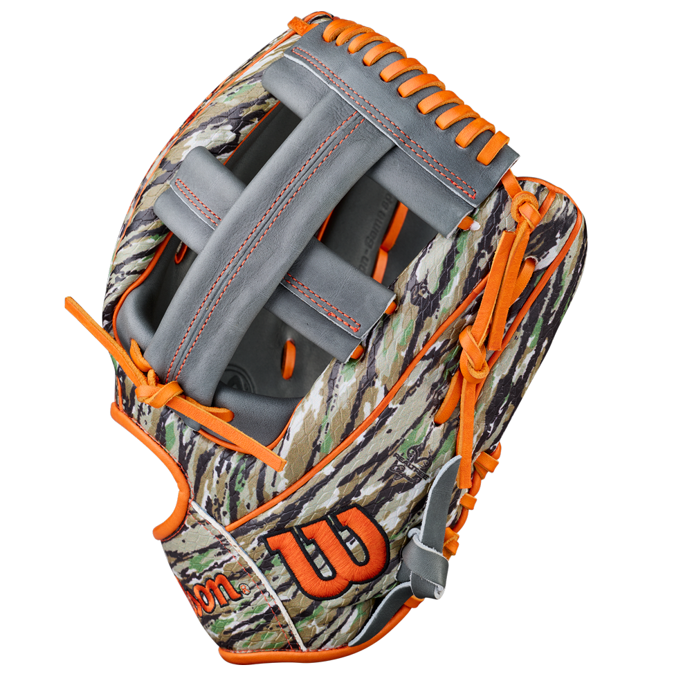 The Wilson A2000 GH2 11.75" Gunnar Henderson GM Baseball Glove (WBW1034511175) features a camouflage design, gray webbing, bright orange laces, plus an orange W logo and Wilson branding on the lower part of this infield glove.