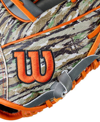 A close-up of the Wilson A2000 GH2 11.75" Gunnar Henderson GM Baseball Glove, showcasing its camouflage design with orange trim and a prominent orange and black Wilson "W" logo on the side.