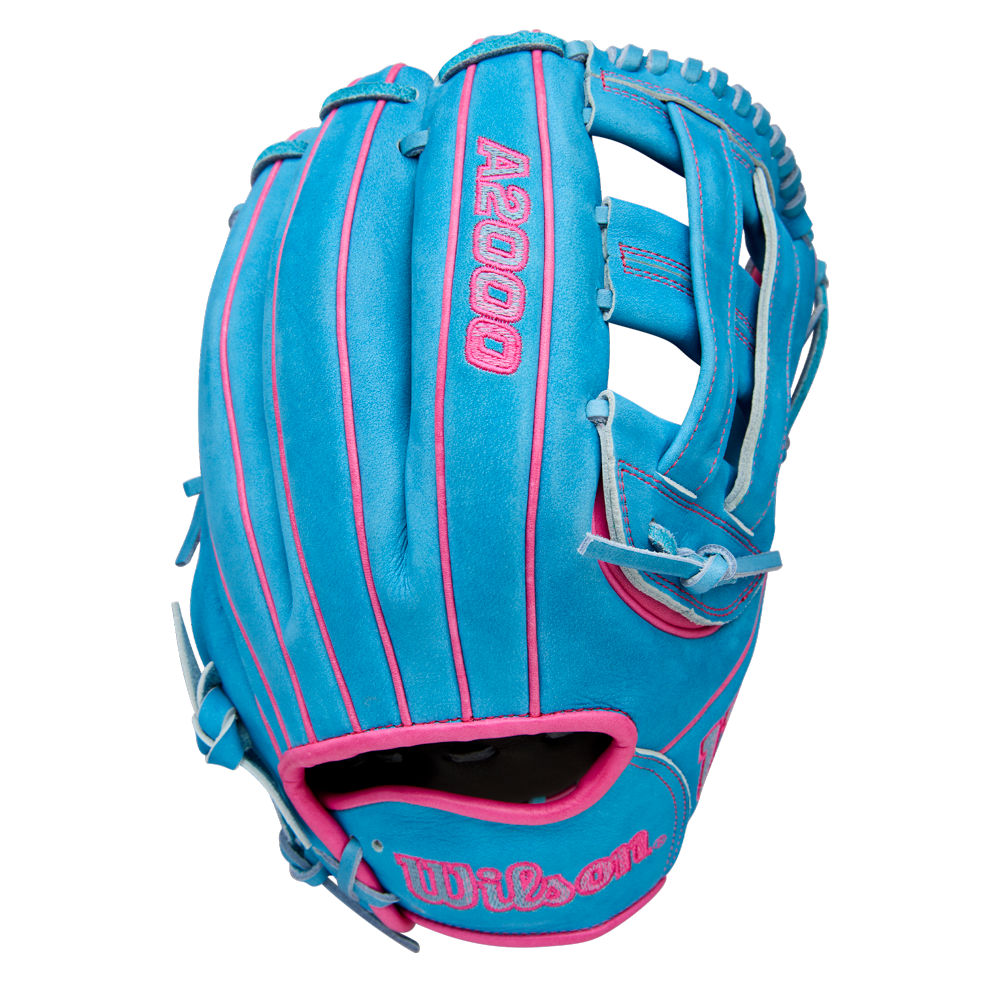 The Wilson A2000 EDLC44 12" Elly De La Cruz Gameday Baseball Glove (FALL 2025) features a teal design with pink accents and stitching, plus "A2000" and "Wilson" in pink on the back.