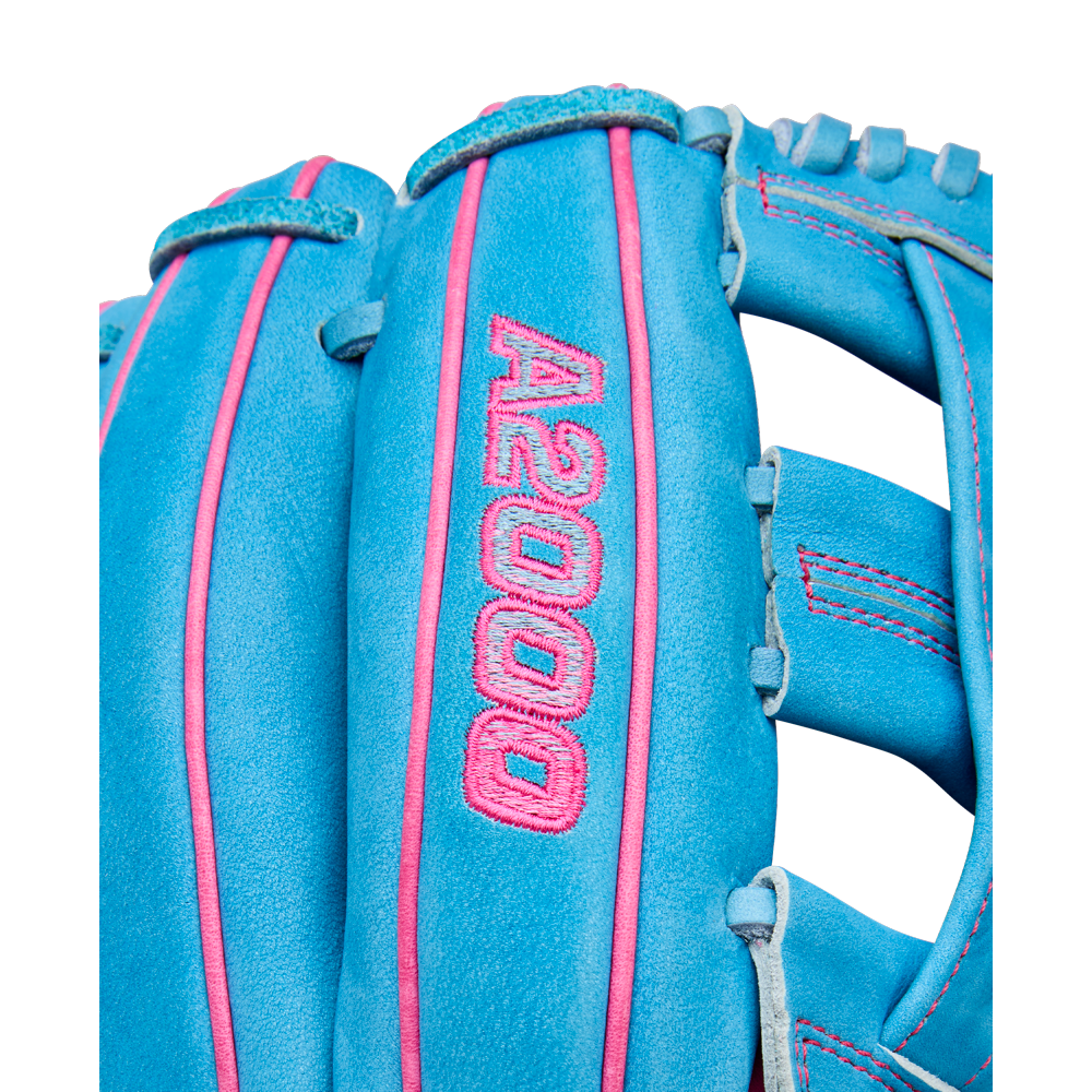 Close-up of the Wilson A2000 EDLC44 12" Elly De La Cruz Gameday Baseball Glove with pink stitching and embroidered A2000 text—crafted for infield precision and style. Model: WBW10345212, FALL 2025.