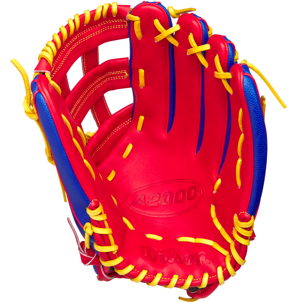 The Wilson A2000 1799SS 12.75" Pete Crow-Armstrong GM Baseball Glove (GOTM Jan 2025) features a red and blue design inspired by Pete Crow-Armstrong and the iconic A2000 1799SS style.