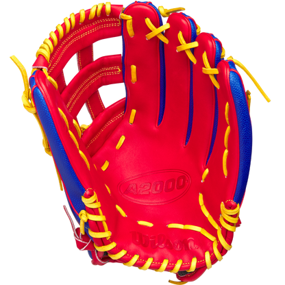 The Wilson A2000 1799SS 12.75" Pete Crow-Armstrong GM Baseball Glove (GOTM Jan 2025) features a red and blue design inspired by Pete Crow-Armstrong and the iconic A2000 1799SS style.